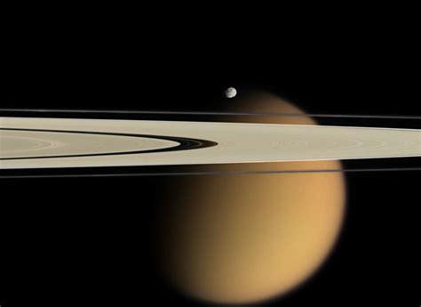 Titan Beyond The Rings When Orbiting Saturn Be Sure To Wa Flickr