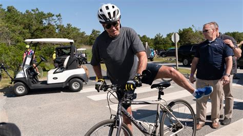 Us President Joe Biden Takes A Fall From His Bike While On A Morning