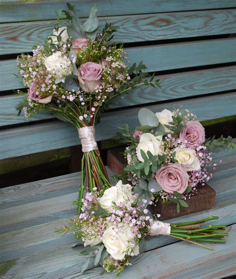 vintage rose and gypsophila bridal bouquet pretty with coin eucalyptus and waxflowers mixed in