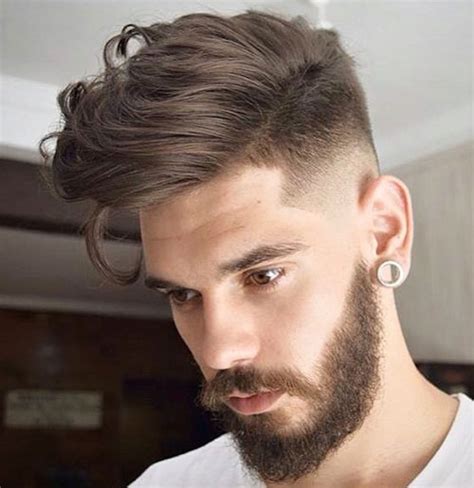 Hair is cut at a shorter length near the bottom and is gradually blended into a longer length higher up towards the top of your head. The 69 Best Fade Haircuts For Men 2018