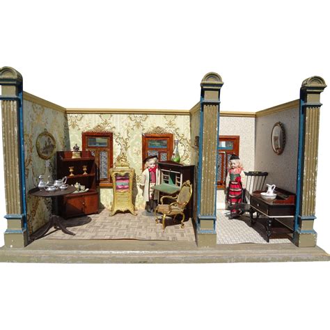 A Doll House With Furniture And Accessories In It