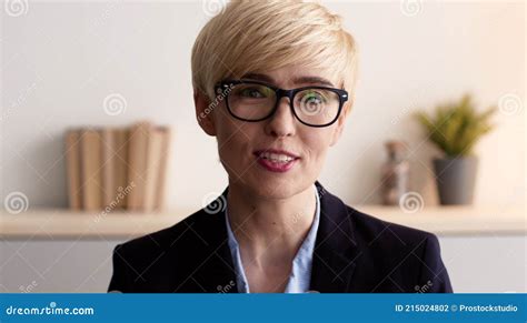 Close Up Portrait Of Positive Mature Woman Coach Wearing Eyeglasses