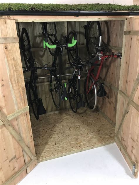 If you're still looking for a fully stocked shed kit that has some personality, but you just haven't seen the one that quite suits your yard yet, maybe this kit from best barns inc is worth looking at. Studio pic of a 4-bike Vertical bike shed | Bike storage ...
