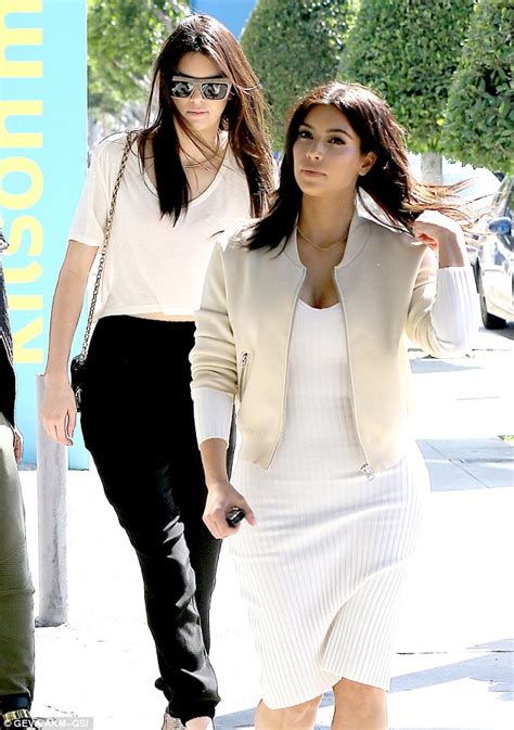 Kim Kardashian Bares Cleavage While Sister Kendall Jenner Reveals Toned