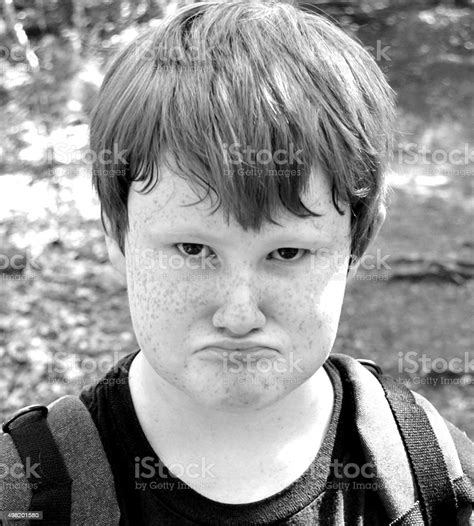 Portrait Of Pouting Child In Black And White Stock Photo Download