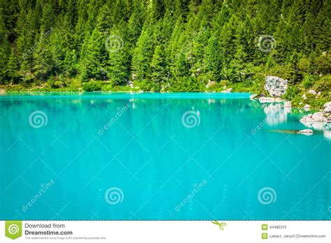 Turquoise Sorapis Lake In Cortina D Ampezzo With Dolomite Moun Stock