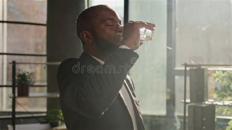 African American Ethnic Mature Businessman Senior Man Entrepreneur Drink Water Glass Of Pure
