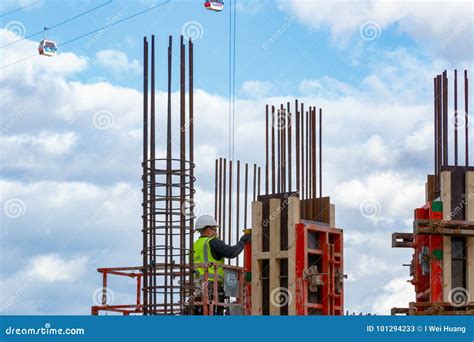 Construction Worker At A New Development Building Site In North