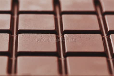 Texture Of Dark Chocolate Close Up Segments Of A Chocolate Bar In