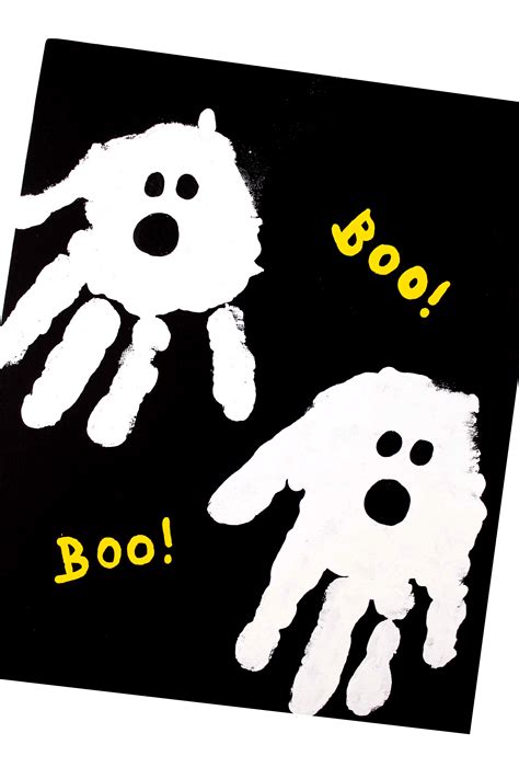 Halloween Hand Print Craft For Preschool Kids · The Inspiration Edit