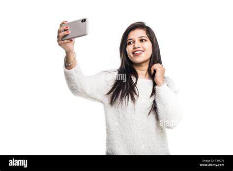Indian Young Girl Taking Selfie With Smartphone Stock Photo Alamy