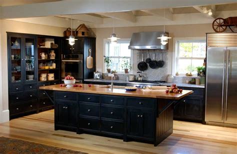 In the small space, your black cabinets may emphasize the small size of the room, thus causing the cramped and tight feel, which surely needs to be avoided. Black Kitchen Cabinets