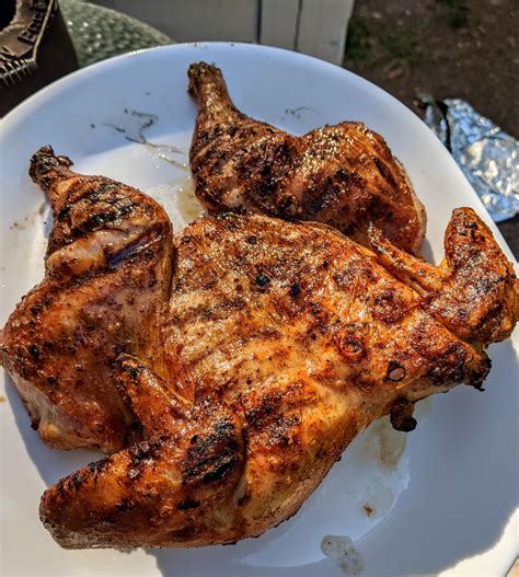 Spachcocked chicken cooked on the BGE. Cooked indirect and weighted ...