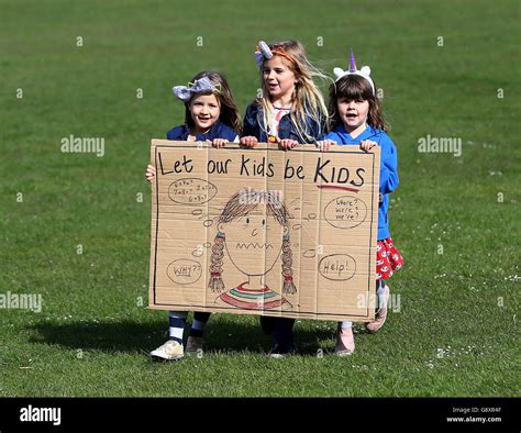 Schoolgirls Hold A Protest Sign As Parents Hold A Rally In Preston