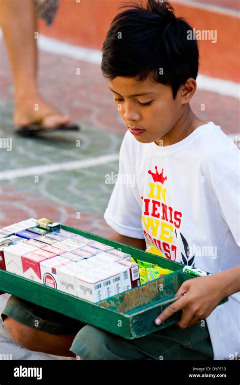 Little Boy Selling Cigarettes In Angeles City Luzon Philippines Stock