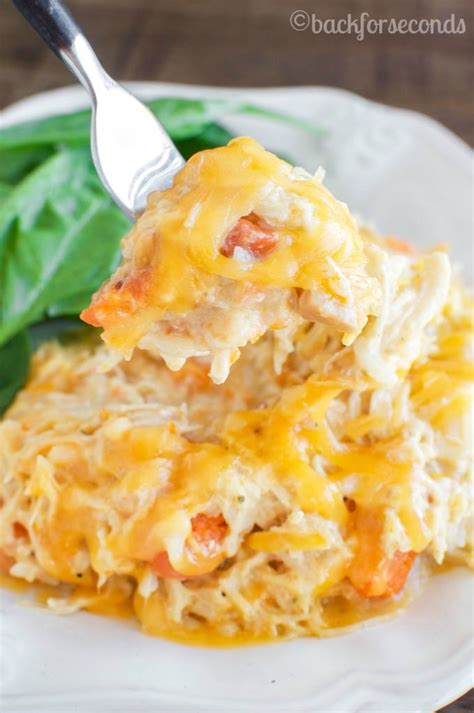 Top chicken with green onions. Easy Cheesy Crockpot Chicken - Back for Seconds