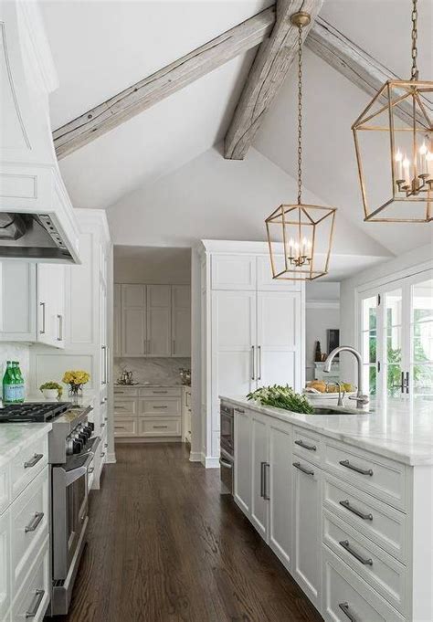 Most pendant lights that use downrods can be modified to hang straight down from a sloped ceiling by installing a. 15 Ideas of Pendant Lights for Sloped Ceilings