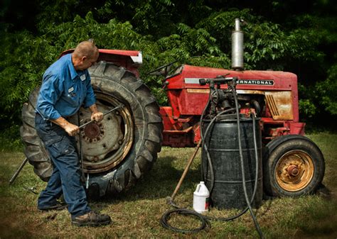 Use the valve core removal tool to take the valve core out of the tire therefore letting out all of the pressure. How to Remove a Tractor Tire From a Rim