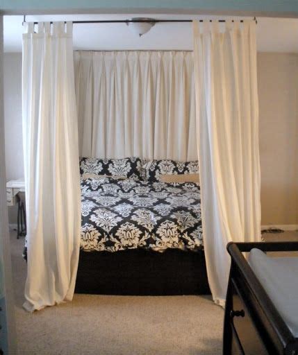 Diy bed canopy, want make your own bed canopy made one our daughter room five years ago turned out pretty cute also doubled creative concealment there unnecessary awkward window behind curtain pulled fabric. diy canopy bed - using curtain rods above bed onto ceiling ...