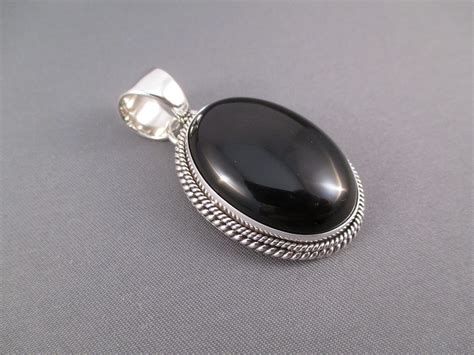 Onyx And Sterling Silver Pendant Two Grey Hills