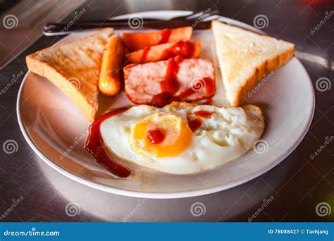 Breakfast With Fried Eggs Ham And Sausages Stock Image Image Of