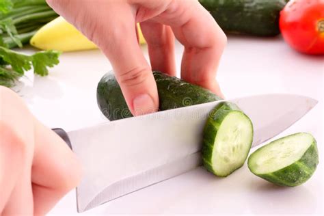 Someone Cutting A Cucumber Stock Image Image Of Slice 10668577