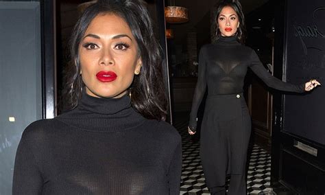 Nicole Scherzinger Flashes Her Bra In A Sheer Ribbed Top