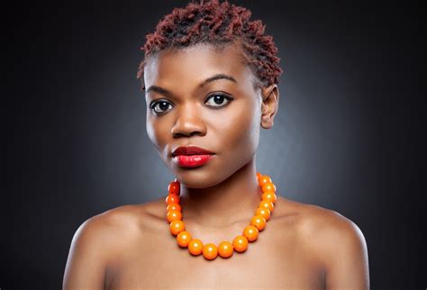 An impressive short black haircut with thick hair with surgical lines. TWA Hairstyles for Women with Natural Hair