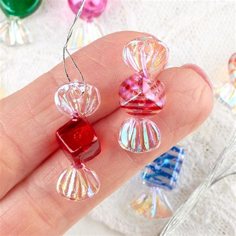 Here are some of the candy cane crafts and ornaments we have. Miniature Wrapped Candy Ornaments - Christmas Ornaments - Christmas and Winter - Holiday Crafts ...