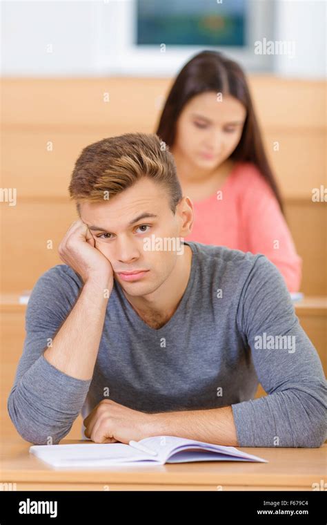 Handsome Young Student Looks Bored With Lecture Stock Photo Alamy