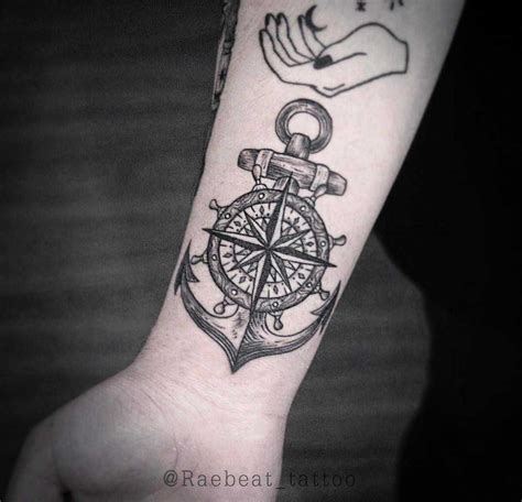 A Black Anchor Compass Tattoo Inked On The Right Wrist Compass Tattoo