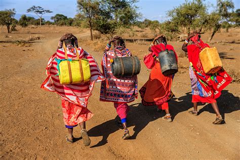 Maasai Women Carrying Water Thomson Safaris