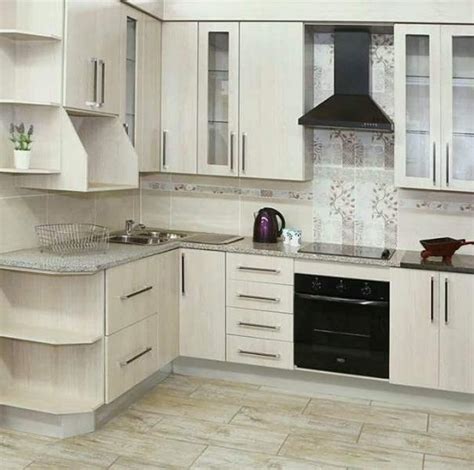 Rustic doesn't necessarily mean dark and old—this design style has been popular for some time now and we're happy to see that it's still the case. Kitchen fitted in built cupboards | Port Elizabeth ...