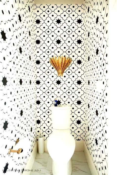 Taj Trellis Noir Wallpaper Frames This Small Powder Room All Bathroom