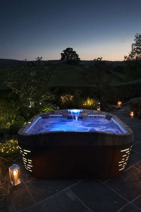 Visit jacuzzi.com for the highest quality hot tub, sauna, and shower products and accessories. Hot Tub lit up at night | Hot tub, Jacuzzi hot tub, Hot ...