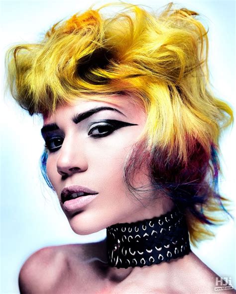 Bright Yellow Hair With Brushed Out Curls Creating Volume And Height