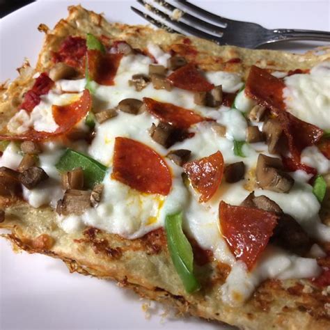 In a medium bowl, mix the ground chicken with ¼ cup parmesan cheese, ¼ cup mozzarella cheese, italian seasoning, salt, black pepper, garlic powder, and onion powder. Keto Pizza with Ground Chicken Crust - Recipe in comments ...