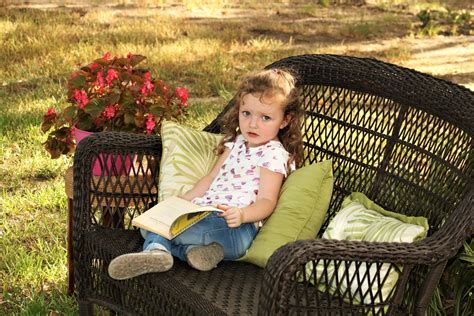Little Girl Reading Book Outdoors Free Stock Photo Public Domain Pictures