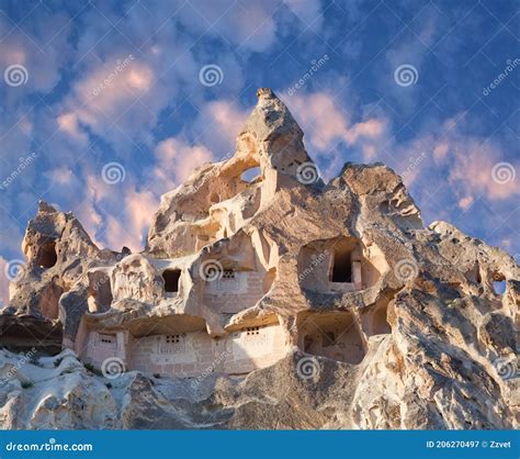 Unique Geological Formations With Birdhouses And Dovecotes In Red