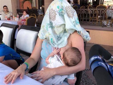Womans Photo Goes Viral After Being Told To Cover Up While Breastfeeding