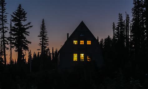 Cabin In The Woods At Night Stock Photo Download Image