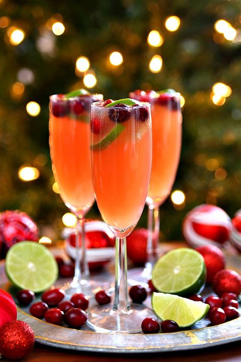 Serve this fruity cocktail at a garden party or wedding reception. Christmas Mimosas - Holiday Cocktail Recipe - Happy-Go-Lucky