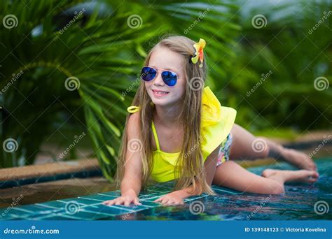 Cute Girl In Sunglasses In The Swimming Pool Outdoors Stock Image Image Of Beautiful