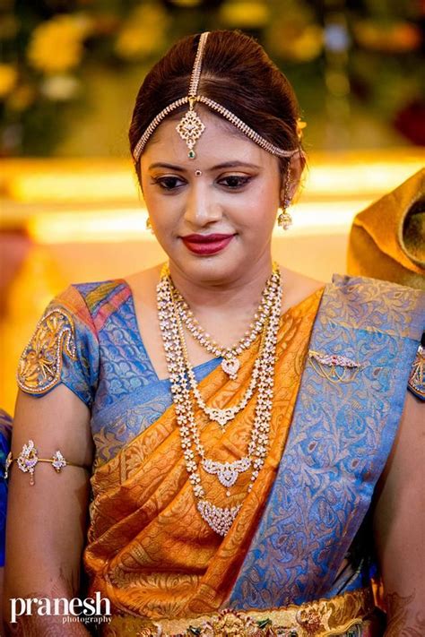 Traditional Southern Indian Bride Wearing Bridal Saree Jewellery And