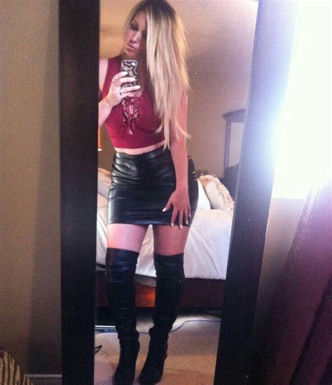 Amateur Blonde Selfie In Bedroom Black Leather Miniskirt And Otk Boots
