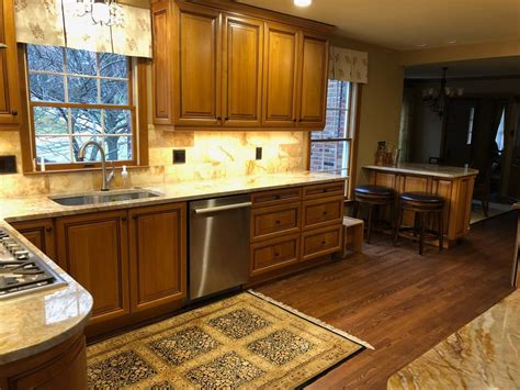 The series is also resistant to moisture and staining so it is very easy to keep clean. Beige Countertops with Rich Medium Wood Cabinets ...