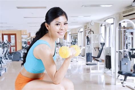 Pretty Girl Exercising With A Dumbbell Stock Photo Image Of Malaysian