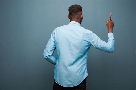 Premium Photo Young African American Black Man Standing And Pointing