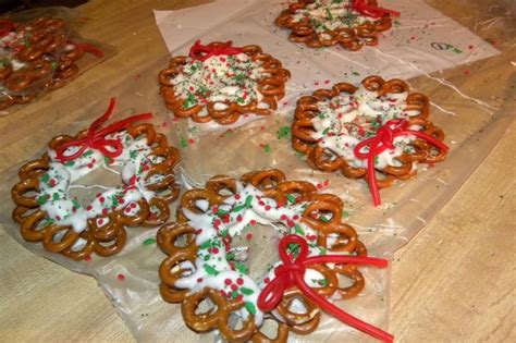 In a microwave safe bowl, melt the white chocolate chips and the coconut oil in the microwave in 30 second intervals, mixing until smooth. Pretzel wreaths | For the Holidays | Pinterest | Lisa ...
