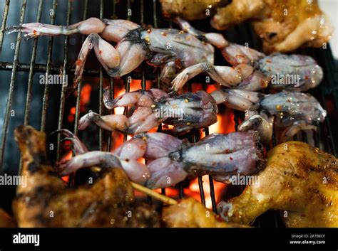 Grilled Frogs Legs Stock Photo Alamy